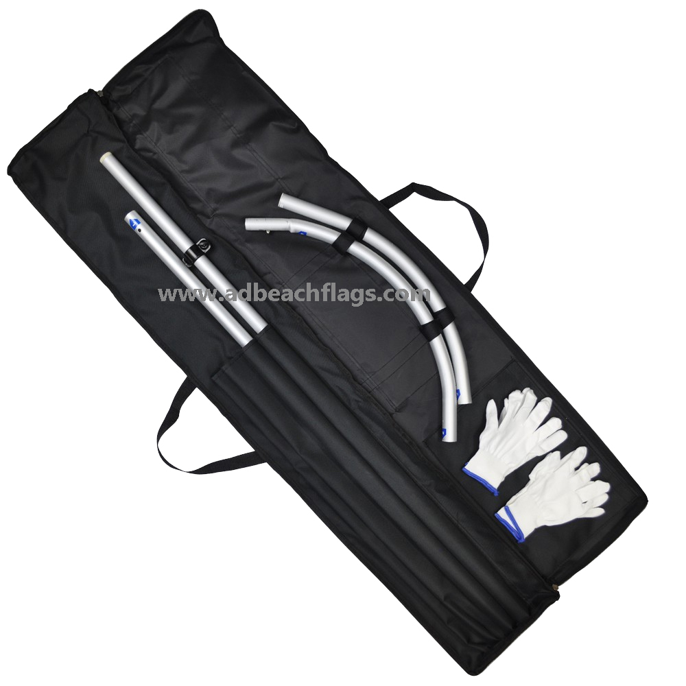 Black oxford carry bag open with flag pole sections and hardware packed inside