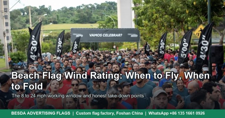 Pace teardrop flags standing over a marathon crowd in a light breeze