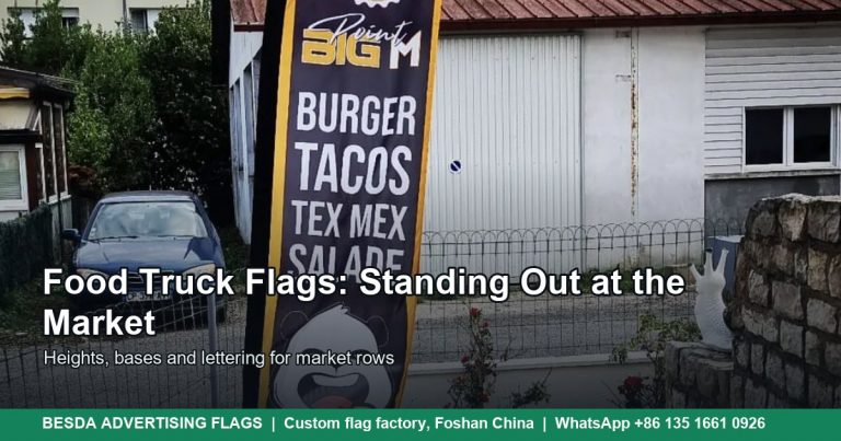 Custom food flag with bold menu lettering at an outdoor stall